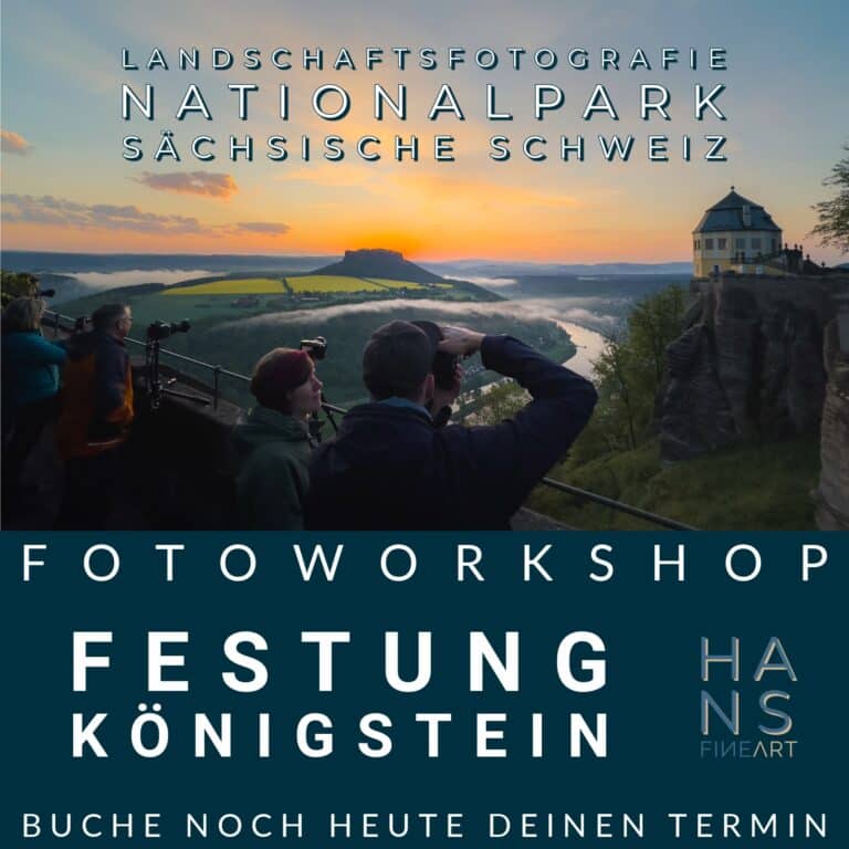 Teilnehmer des Fotoworkshops auf der Festung Königstein fotografieren den Sonnenaufgang über der Sächsischen Schweiz mit Blick auf den Lilienstein.